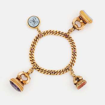 Armband 18K guld med sigillberlocker.