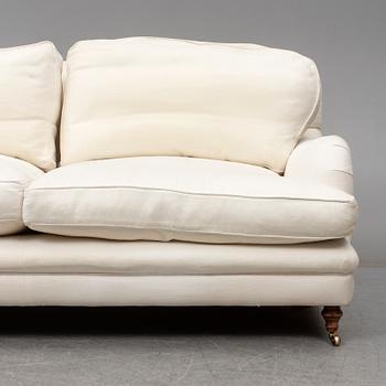 A contemporary Howard sofa.