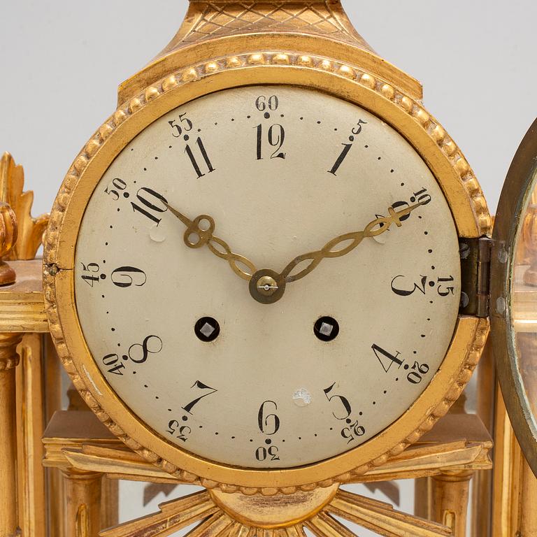 A Gustavian style mantle clock, signed C.A. Carlsson 12/12 1913 Nyköping.