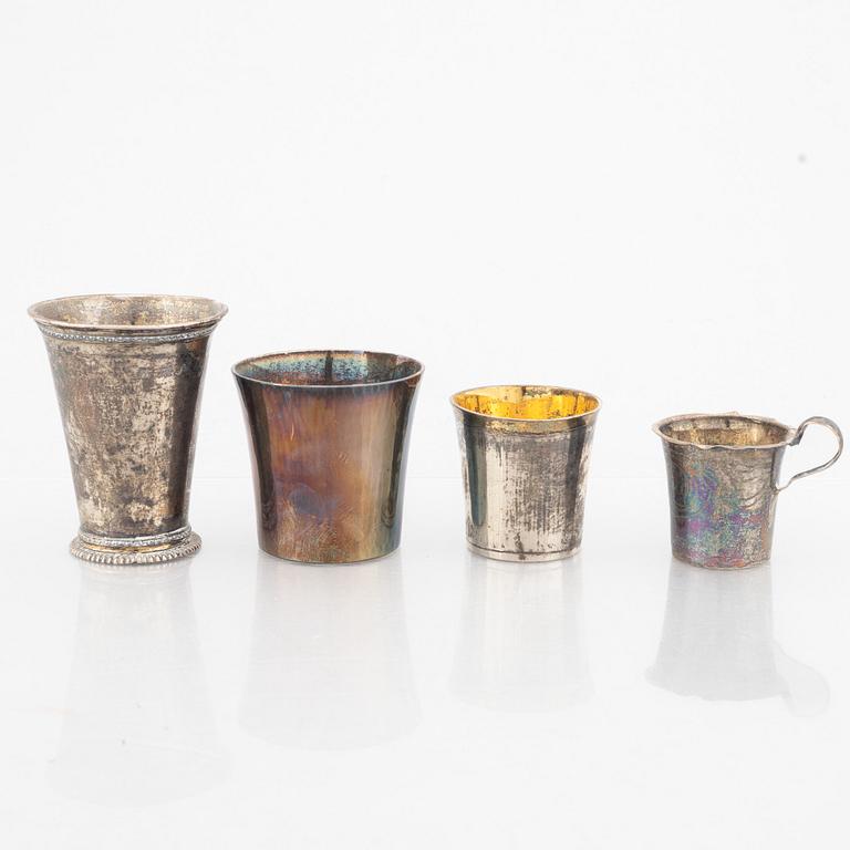 A group of three Swedish silver beakers and a cup, including Carl Beck, Stockholm 1727.