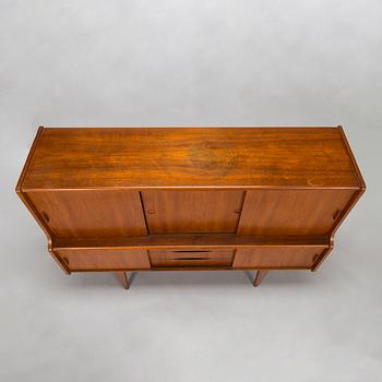 A Danish 1950s-60s cabinet with bar compartment.