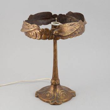 An Art Nouveau table lamp, early 20th century.