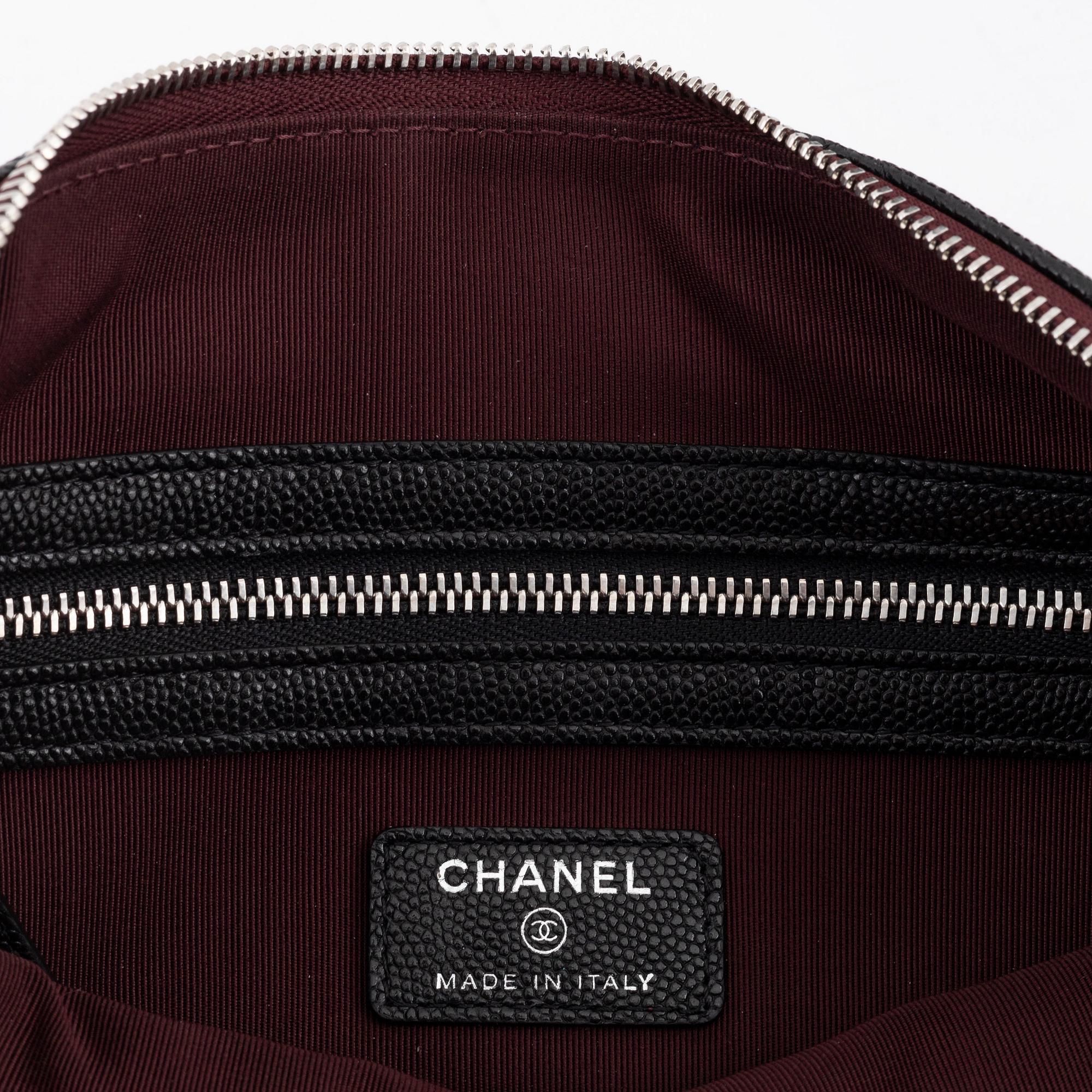 Chanel, a black caviar leather clutch, 2020.
