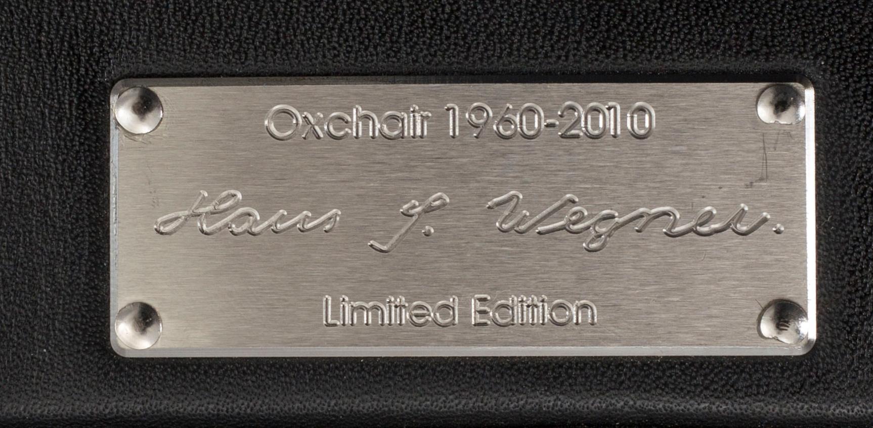 HANS J WEGNER, "Ox chair" lounge chair and stool.