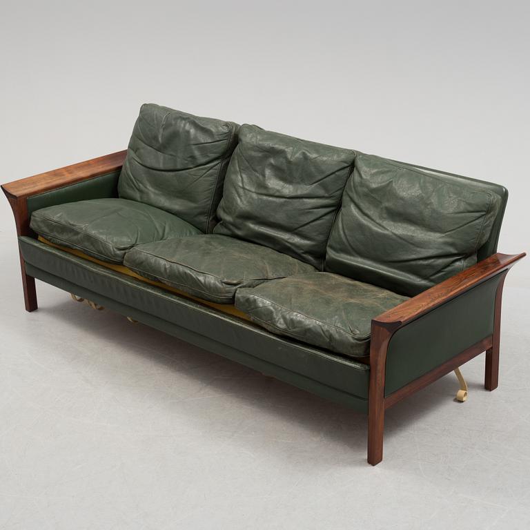 A 1960's Danish sofa, with 2 easy chairs and 2 tables by Glostrup.