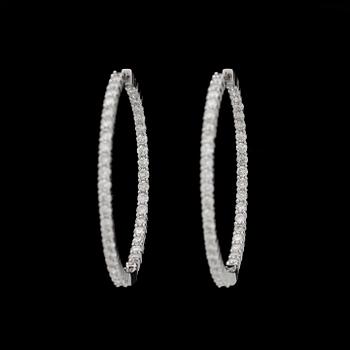 A pair of diamond, 2.64 cts in total, earrings.