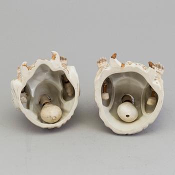 A pair of Chinese style 20th century porcelain nodding figures.