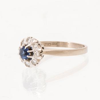 Ring Carmosé 18K white gold with round brilliant-cut sapphire and diamonds, K G Markström Uppsala 1975.