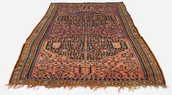 An antique kilim, southeastern Anatolia/Caucasus, c. 398 x 176 cm.