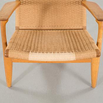HANS J WEGNER, a lounge chair, model "CH-25", for Carl Hansen & Son in Denmark, second half of the 20th century.