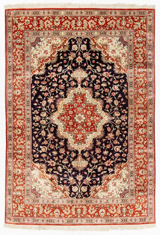 An Qum, silk rug, c. 197 x 138 cm.