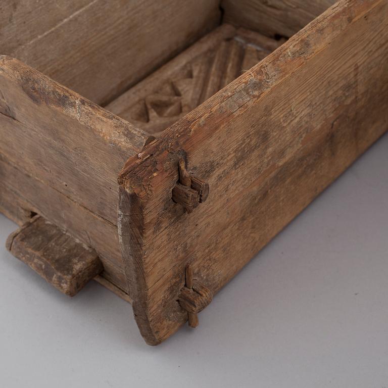 Four handcrafted wooden tins, 19th century.