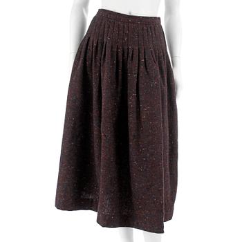 497. YVES SAINT LAURENT, a wool skirt, size 40.