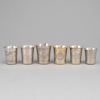 A set of six Russian 19th century parcel-gilt silver vodka cups.