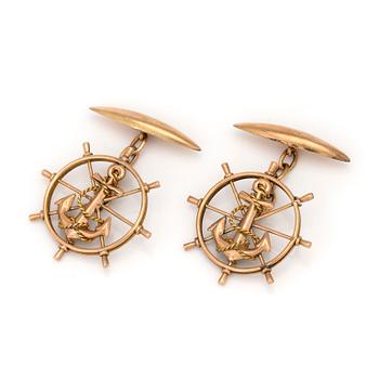 A pair of 14K gold cuff-links.