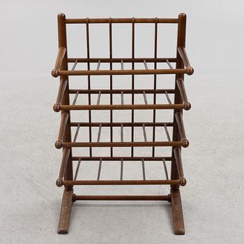 A magazine rack, mid-20th century.