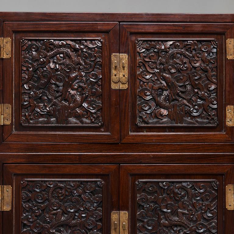 A pair of Chinese hardwood cupboards, late Qing dynasty (1644-1912).