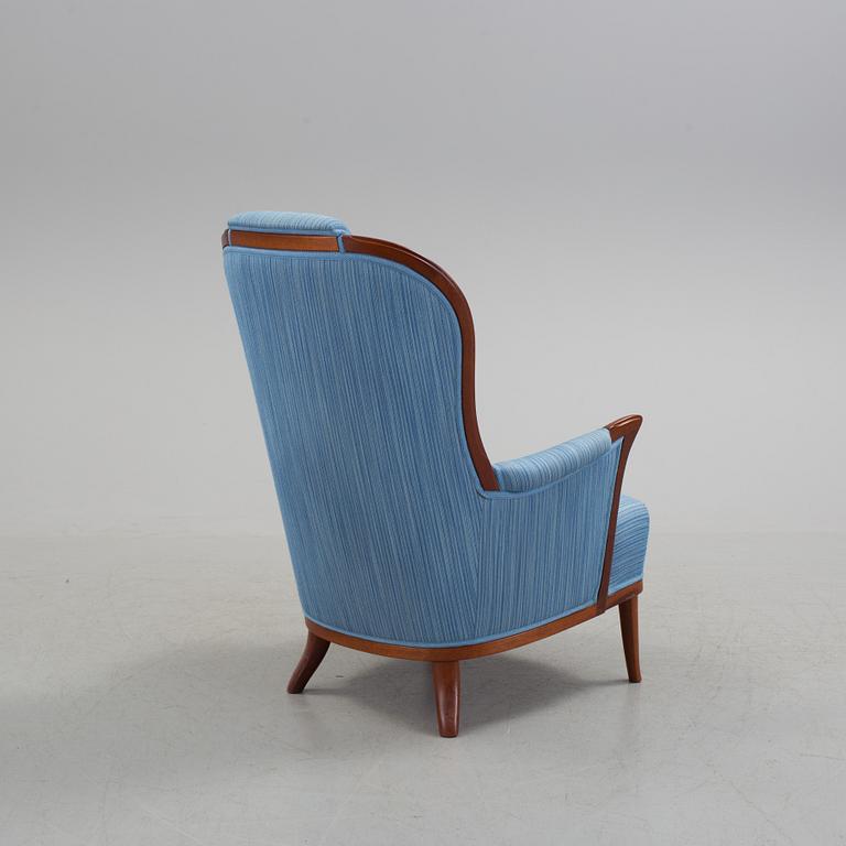 An "Vår Fru" armchair by Carl Malmsten.