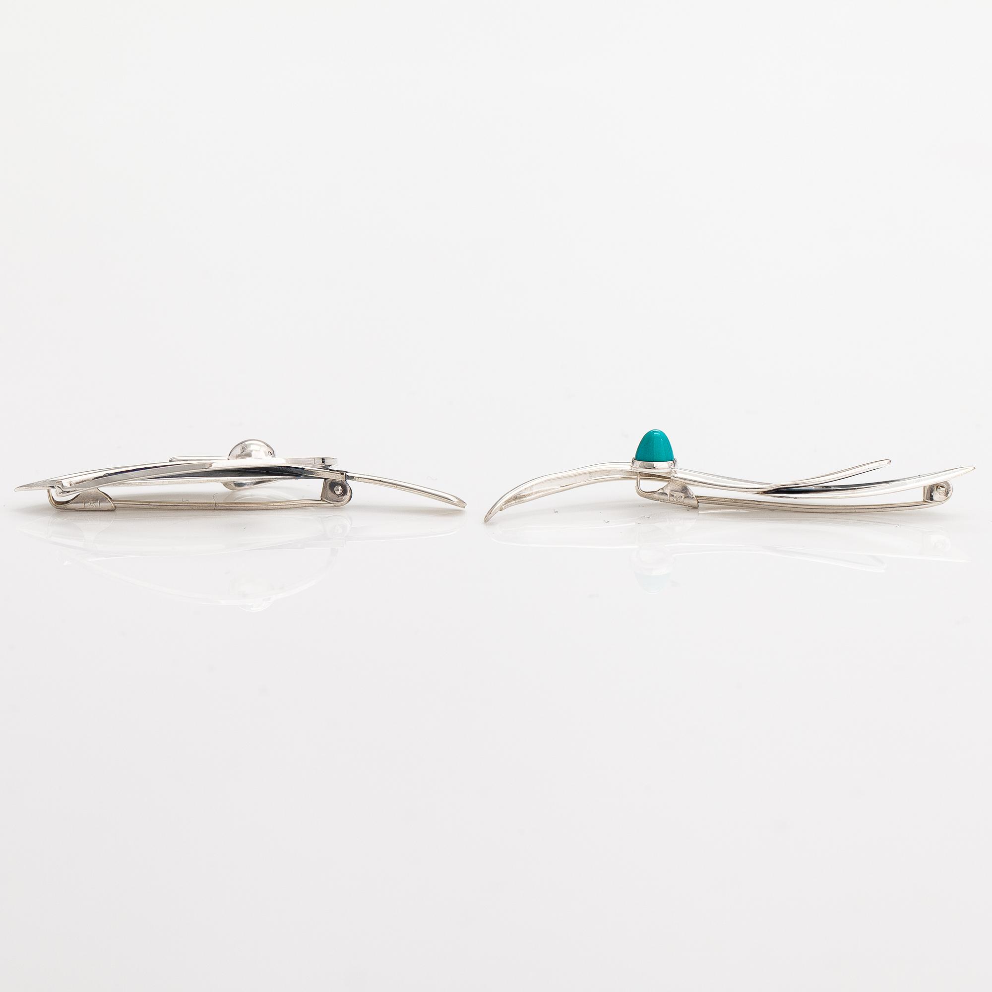 Elis Kauppi, Two silver brooches, one with a tuquoise. Kupittaan kulta, Turku 1961 and 1965.