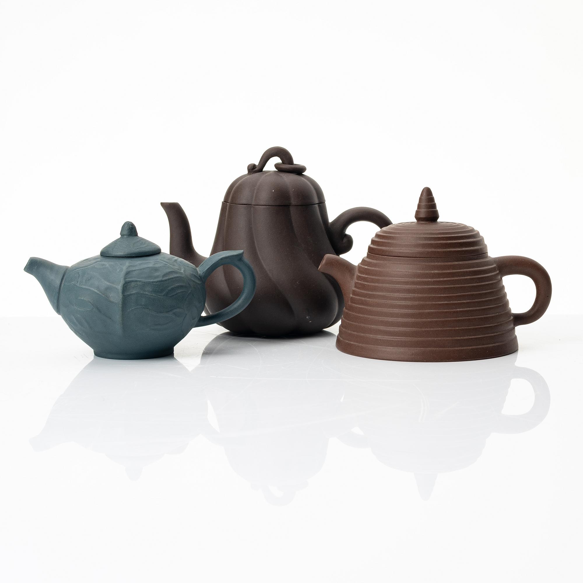 A group of three Chinese yixing 'gongfu' teapots, 1980s.