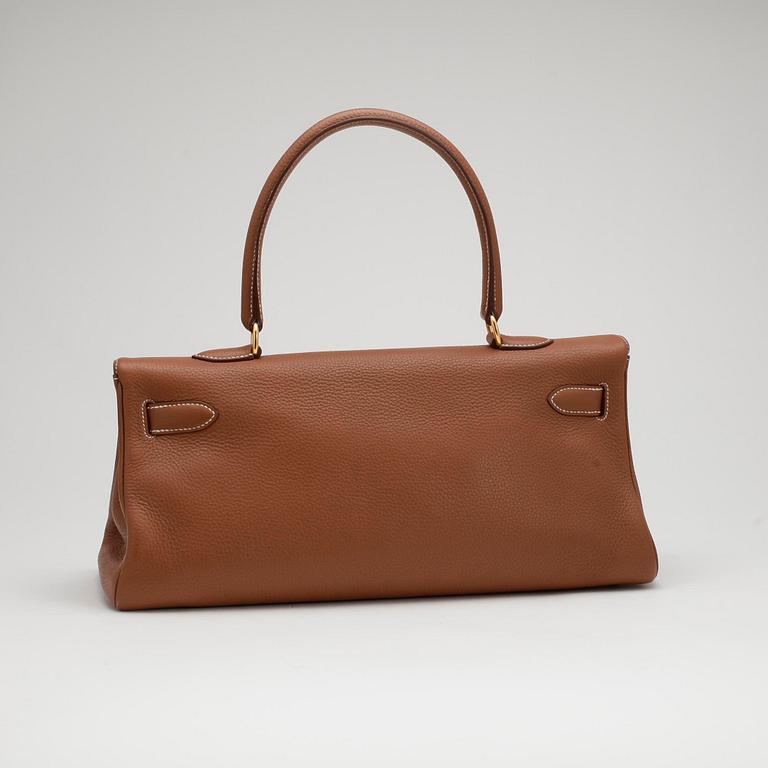 HERMÈS, a beige calf leather "JPG Shoulder Kelly".