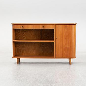 A teak book case. Second half of the 20th Century.