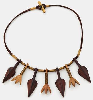 168. Vivianna Torun Bülow-Hübe, a leather, wood and copper necklace, executed in her workshop ca 1948,