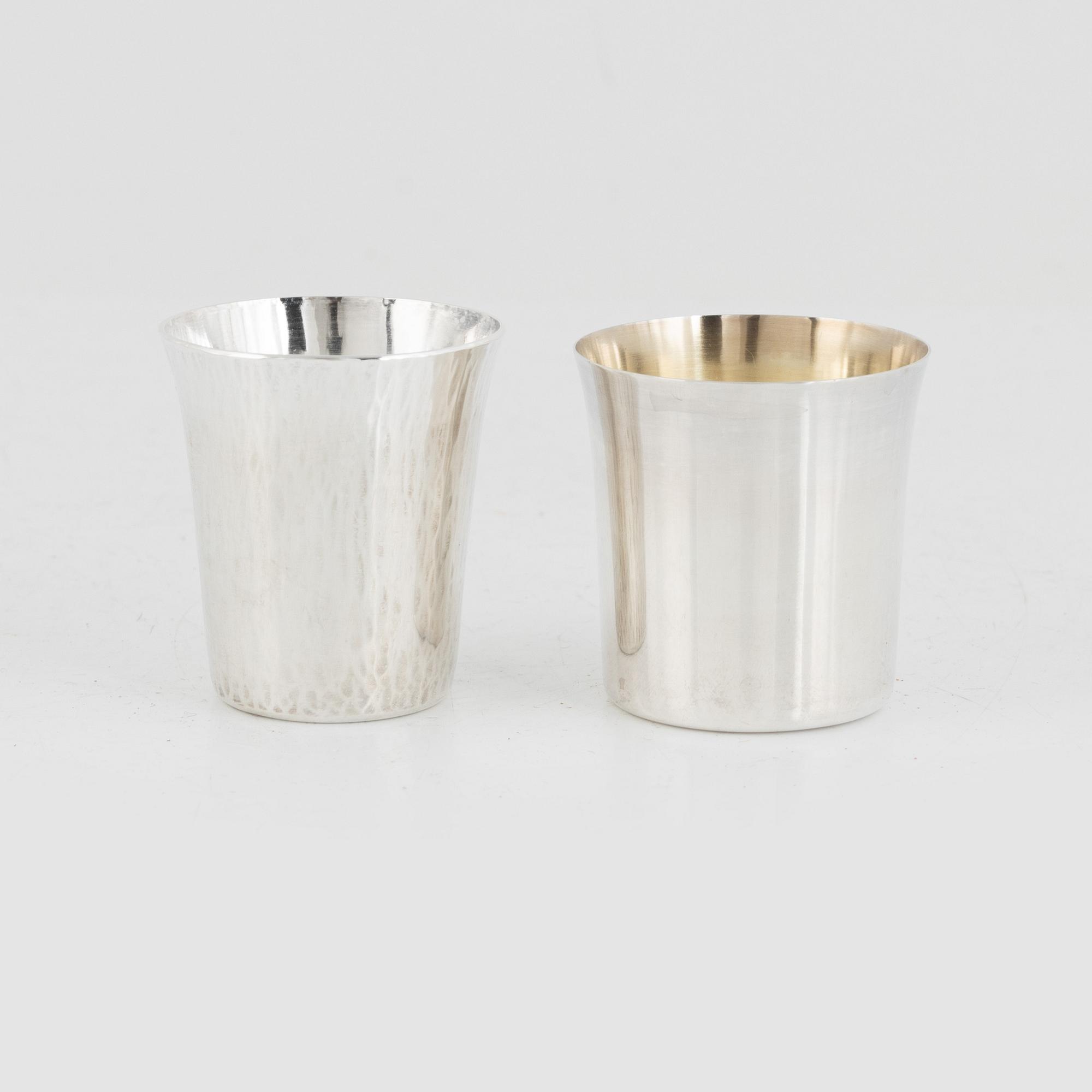 A set of 16 silver cups, including GAB, Stockholm 1964.