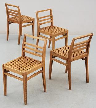 A set of four beech chairs, France 1920's-30's.