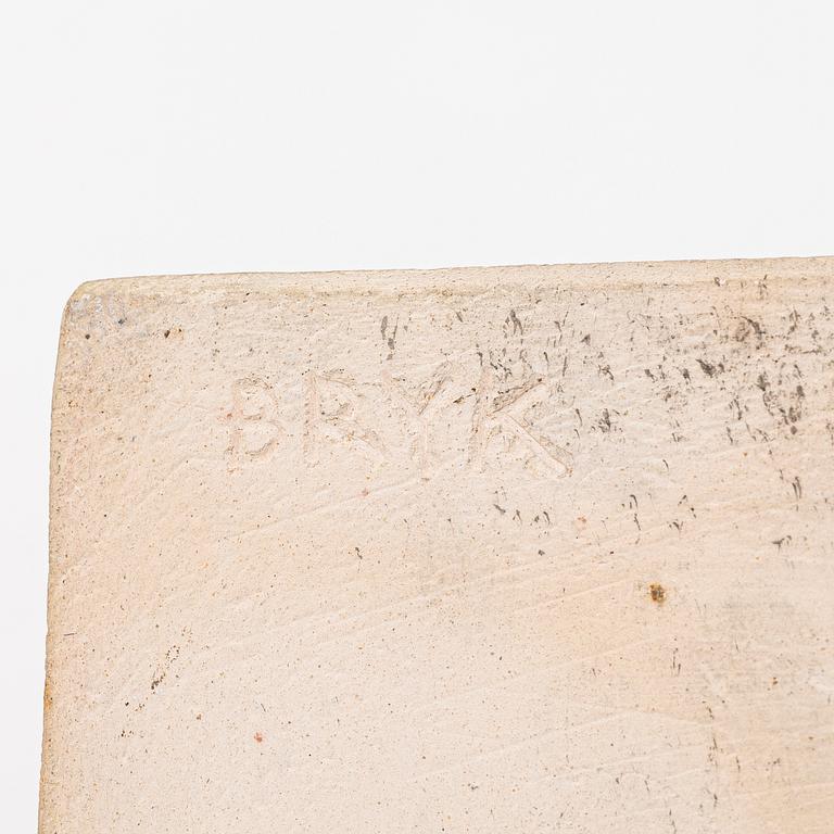 Rut Bryk, plates, as well as plate/wall relief, stoneware.