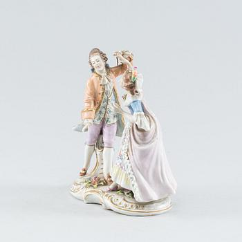 A Rococo style porcelain figure group. First half of the 20th Century.