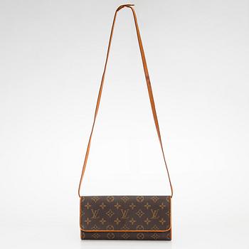 Louis Vuitton, a 'Pochette Twin GM' bag.