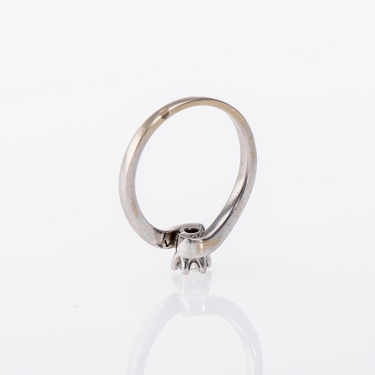RING, 18K vitguld, ca 0,25 ct. Vikt 3,5 g.