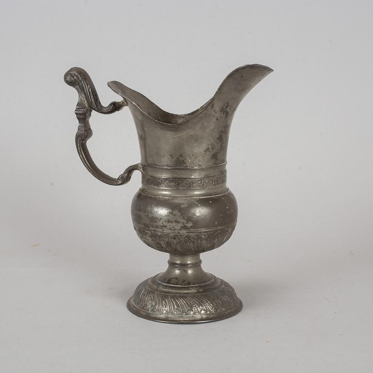 A pewter jug, probably 17th century.