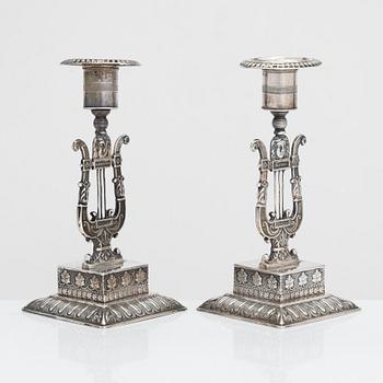 A pair of 19th-century silver candlesticks, maker's mark of Gustaf Folcker, Stockholm 1839.