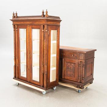 An early 1900s mahogany display cabinet.