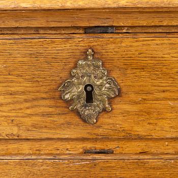 A Rococo cabinet, later part of the 18th Century.