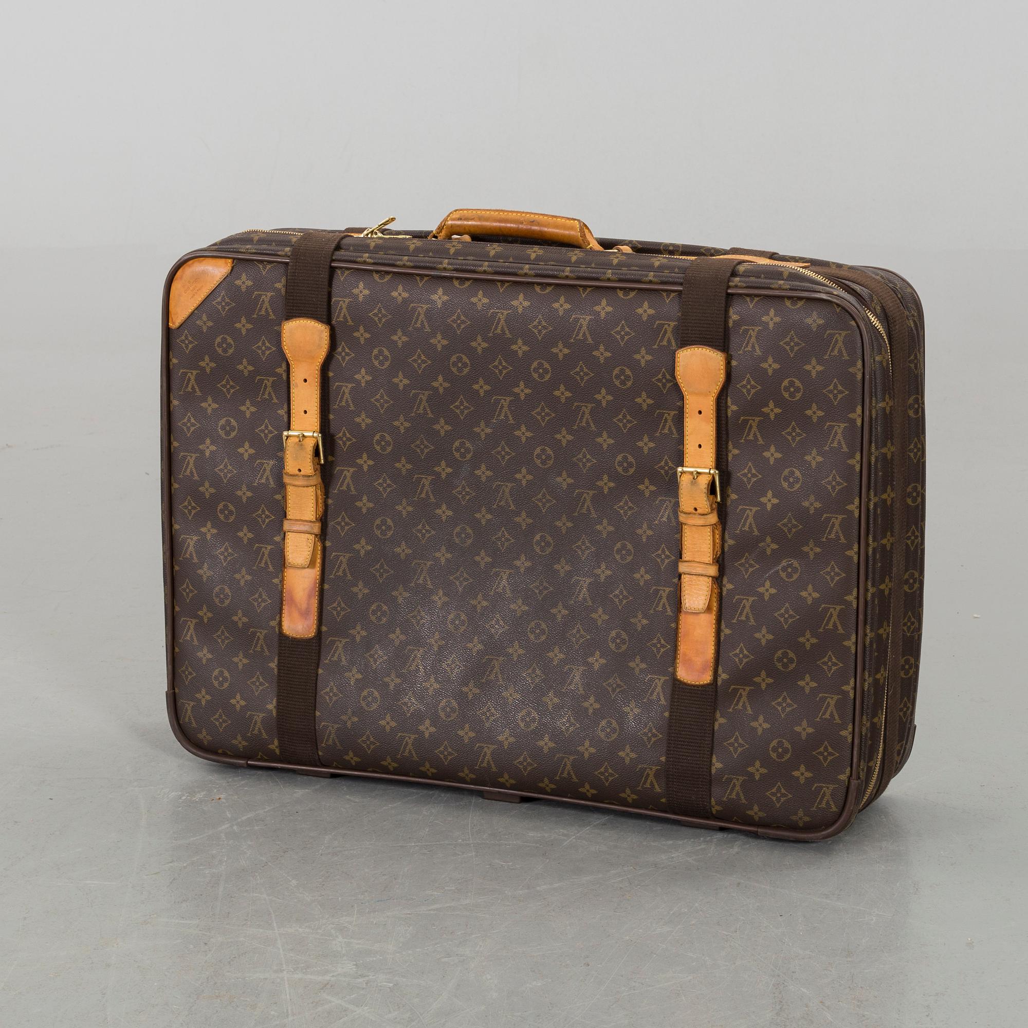 A LOUIS VUITTON  "Satellite 70" SUITCASE.