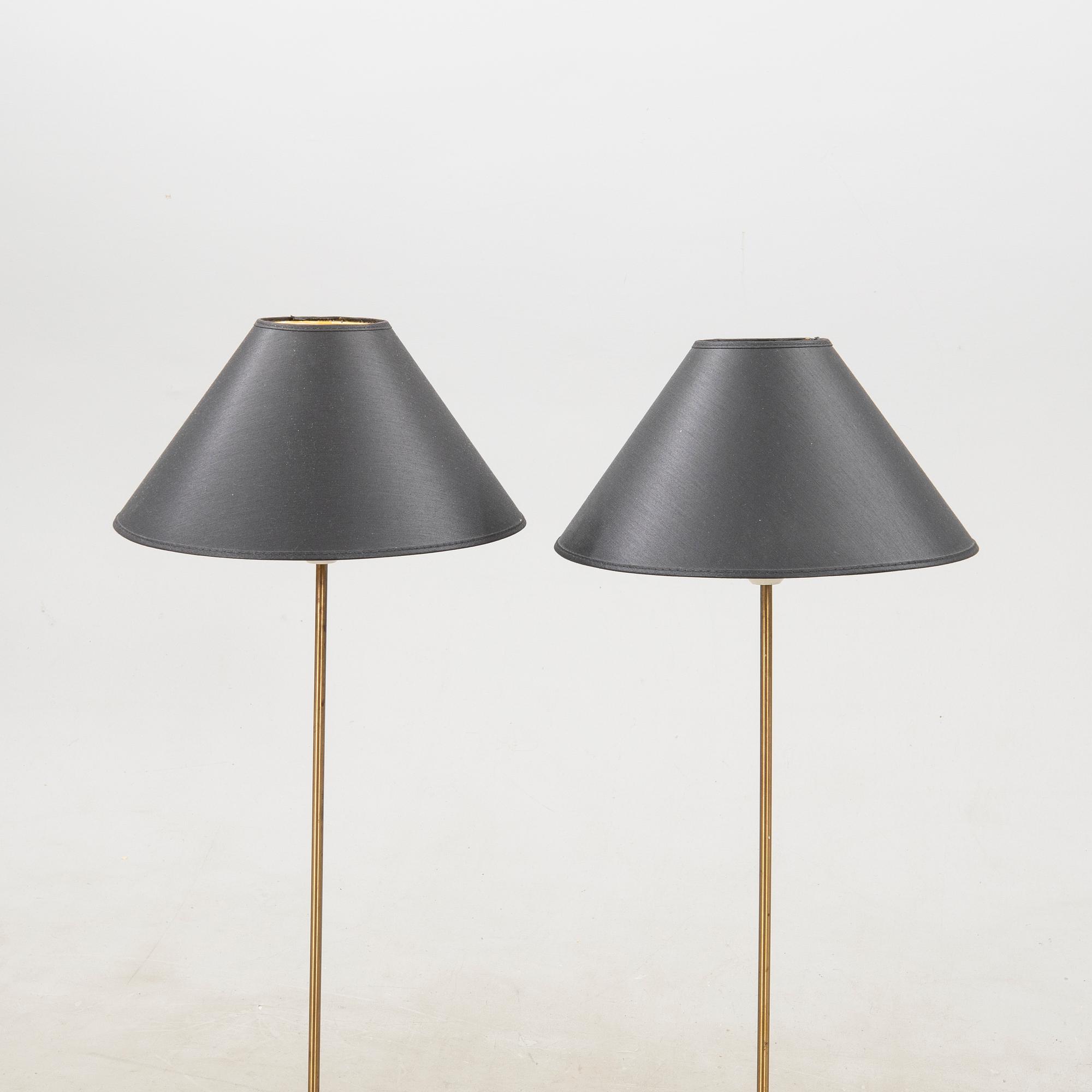 A pair of floor lamps, 1960s.