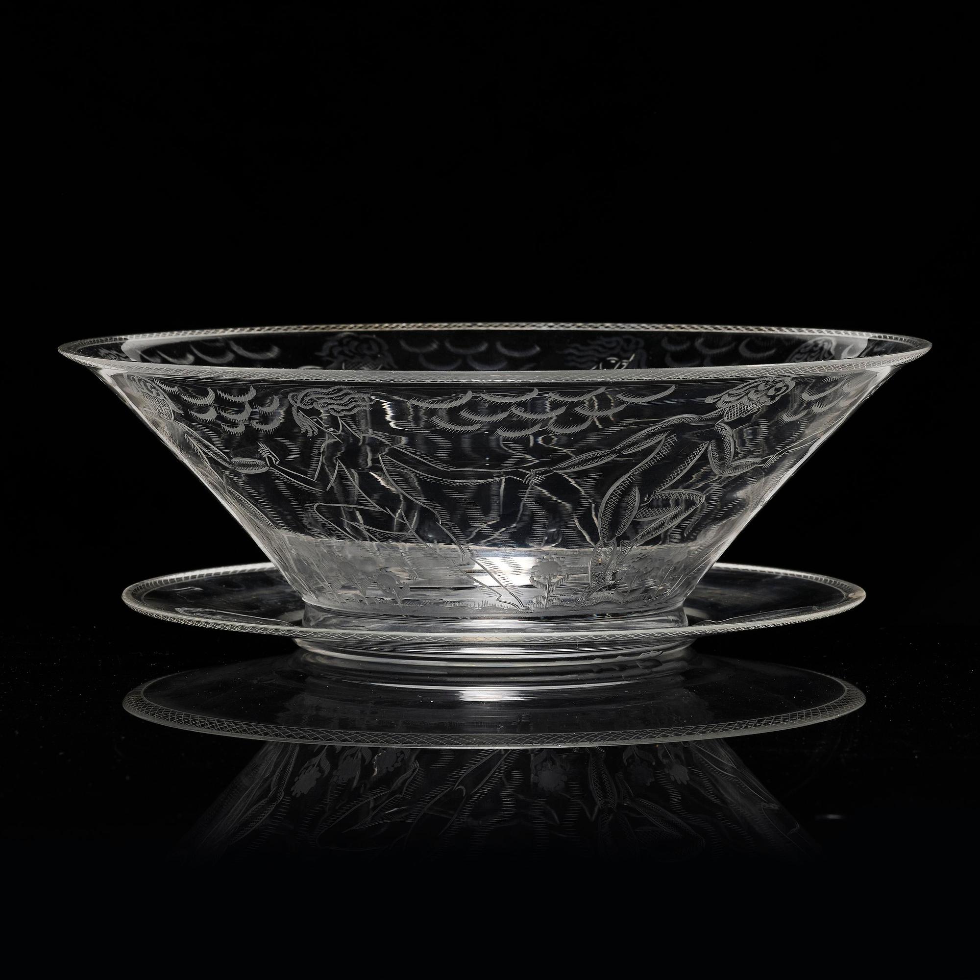 Edward Hald, an engraved glass bowl with plate, Orrefors, Sweden, 1926, model 305, engraved by Emil Goldmann.