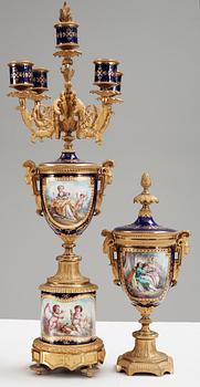 A French 'Sèvres' five piece gilt-bronze garniture, 19th Century, Signed P.D. Boucher.