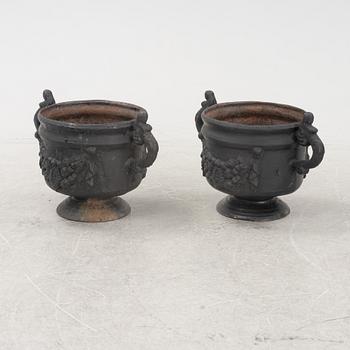 A pair of cast-iron urns from Stafsjö Bruk, 20th Century.