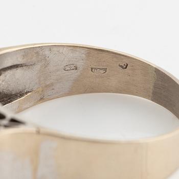 A 14K gold ring set with old-cut diamonds.