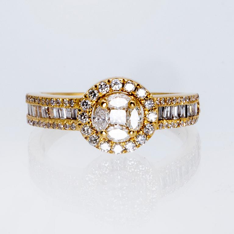 Ring 18K gold navette, brilliant and baguette-cut diamonds approx 1,5 ct in total.