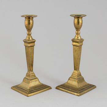 A PAIR OF GUSTAVIAN BRONZE CANDLSTICKS, late 18th century.