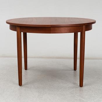 a teak dining table from the second half of the 20th century.