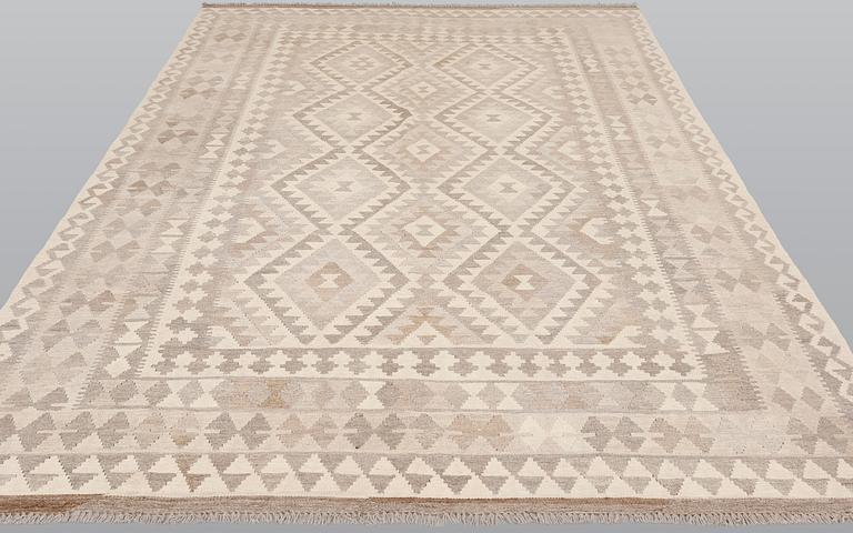 A Kelim carpet, c. 292 x 200 cm.