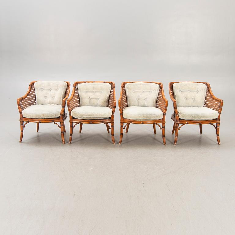 A set of four imitated bamboo and rattan easy chairs later part of the 20th century.