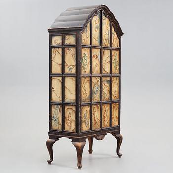 Tor Hörlin, a Swedish Grace decorated oak cabinet, dated 1920.