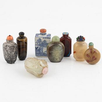 A group of 8 Chinese snuff bottles, 20th Century.